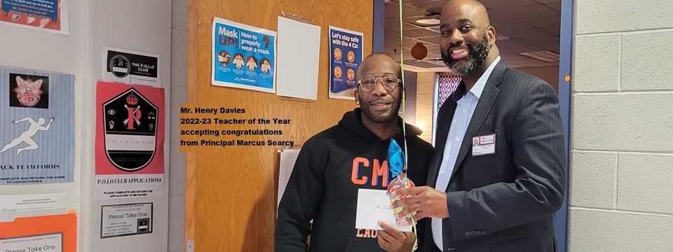 CMS 2022-23 Teacher of the Year, Mr. Henry Davies with Principal Marcus Searcy