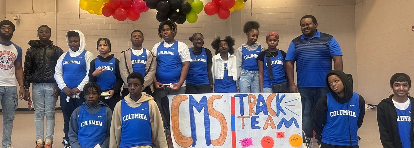 Members of the CMS Track Team in Cafeteria Before their First Meet